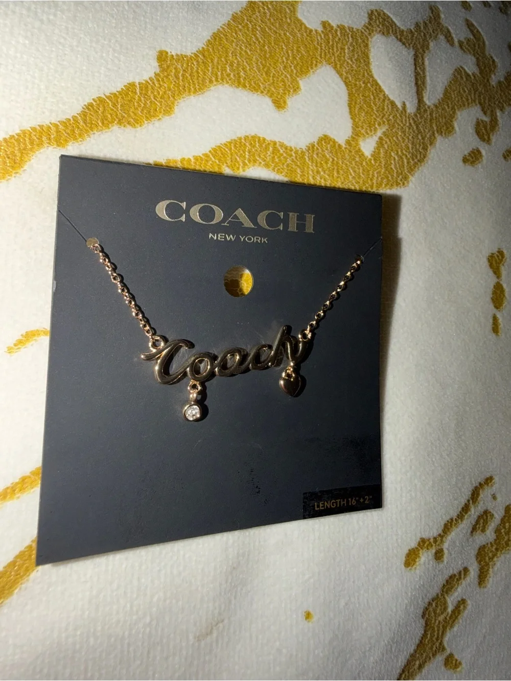 Coach necklace gold